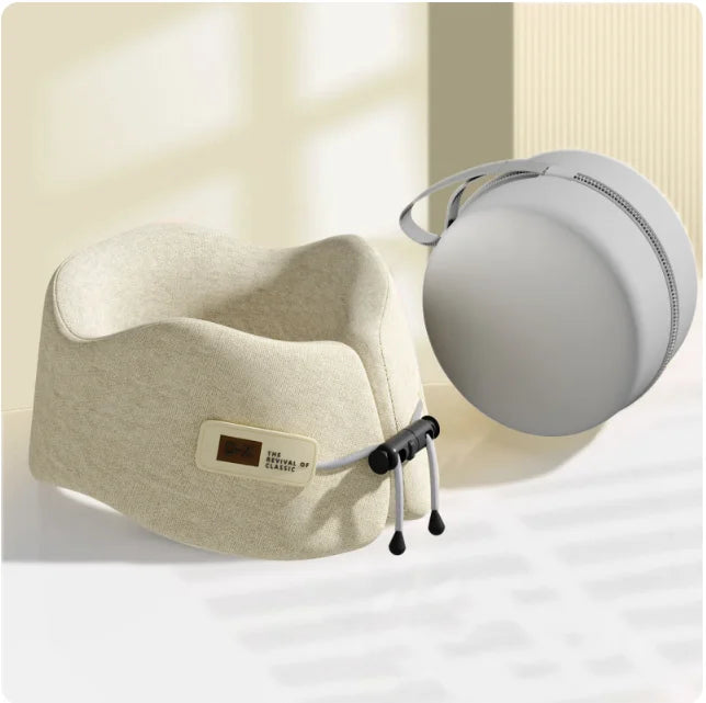 Beige U-shaped travel pillow with a minimalist design, featuring high-density memory foam for exceptional comfort and posture alignment.